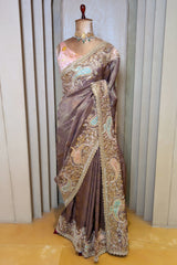 Muave Tissue Floral Woven Saree with Handwork Paisaley Motif Border