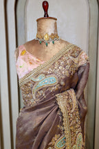 Muave Tissue Floral Woven Saree with Handwork Paisaley Motif Border