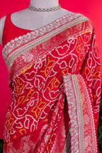 Red Art Silk Bandhani Saree with Banarasi Jacquard Weaving & Embroidered Cutdana Border