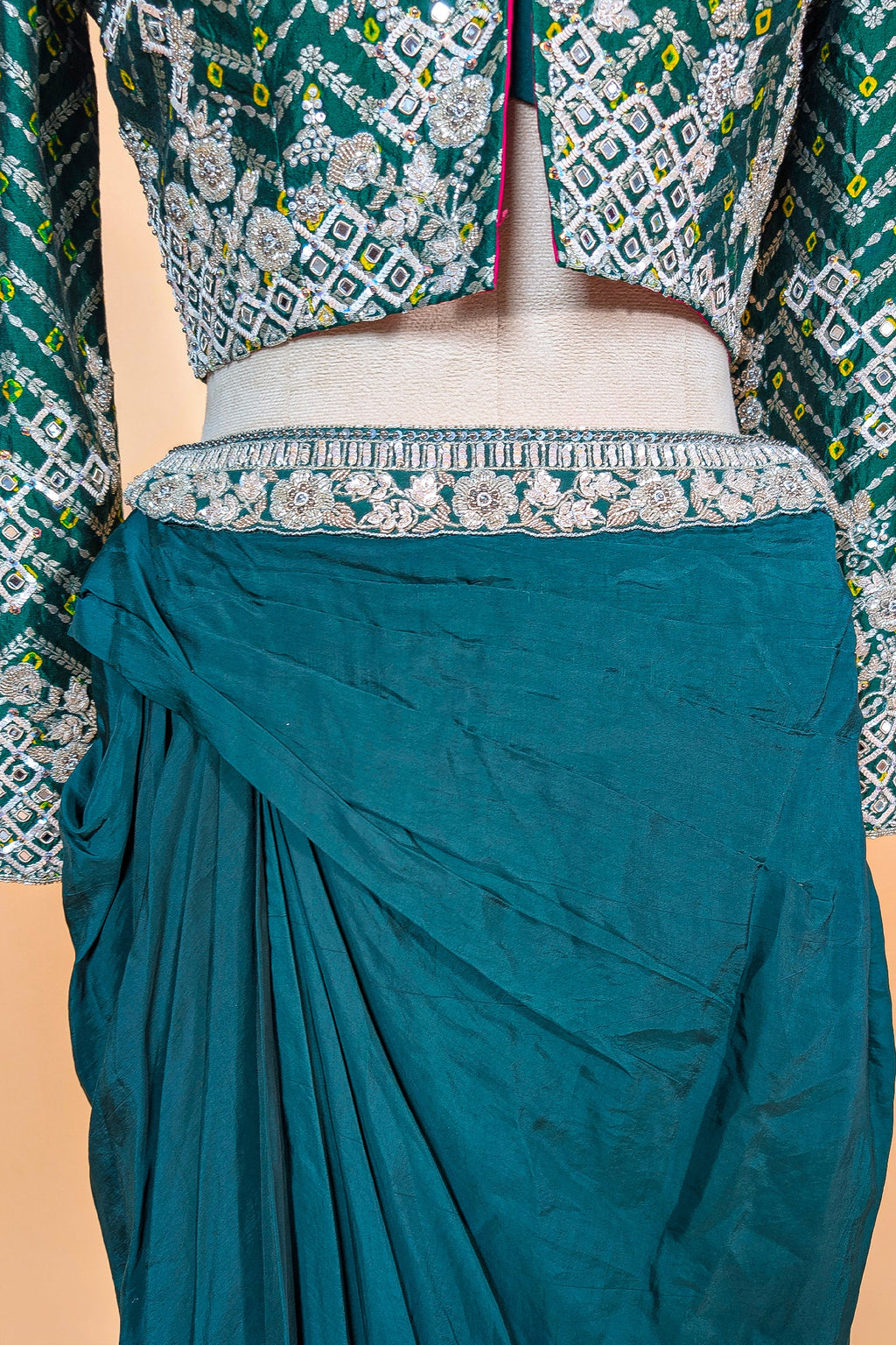 Bottle Green Crepe Silk Pre-Draped Cowl Skirt Set with Hand-Embellished Bandhani Weave Jacket Blouse