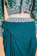 Bottle Green Crepe Silk Pre-Draped Cowl Skirt Set with Hand-Embellished Bandhani Weave Jacket Blouse