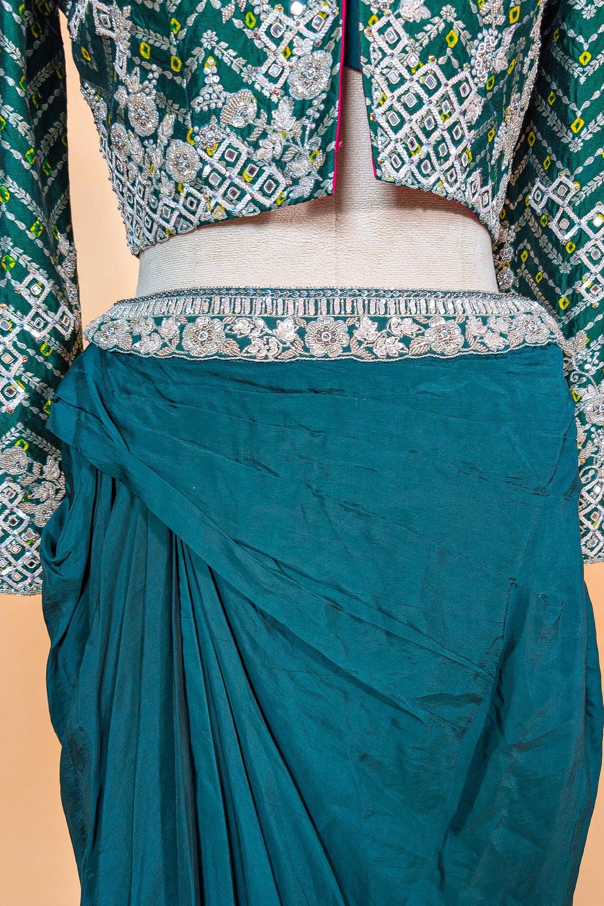 Bottle Green Crepe Silk Pre-Draped Cowl Skirt Set with Hand-Embellished Bandhani Weave Jacket Blouse