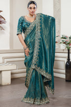Peacock Blue Tissue Dola Silk Solid Saree with Readymade Blouse and Beaded and Zardosi Worked Border - blue silk saree