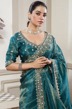 Peacock Blue Tissue Dola Silk Solid Saree with Readymade Blouse and Beaded and Zardosi Worked Border - blue silk saree