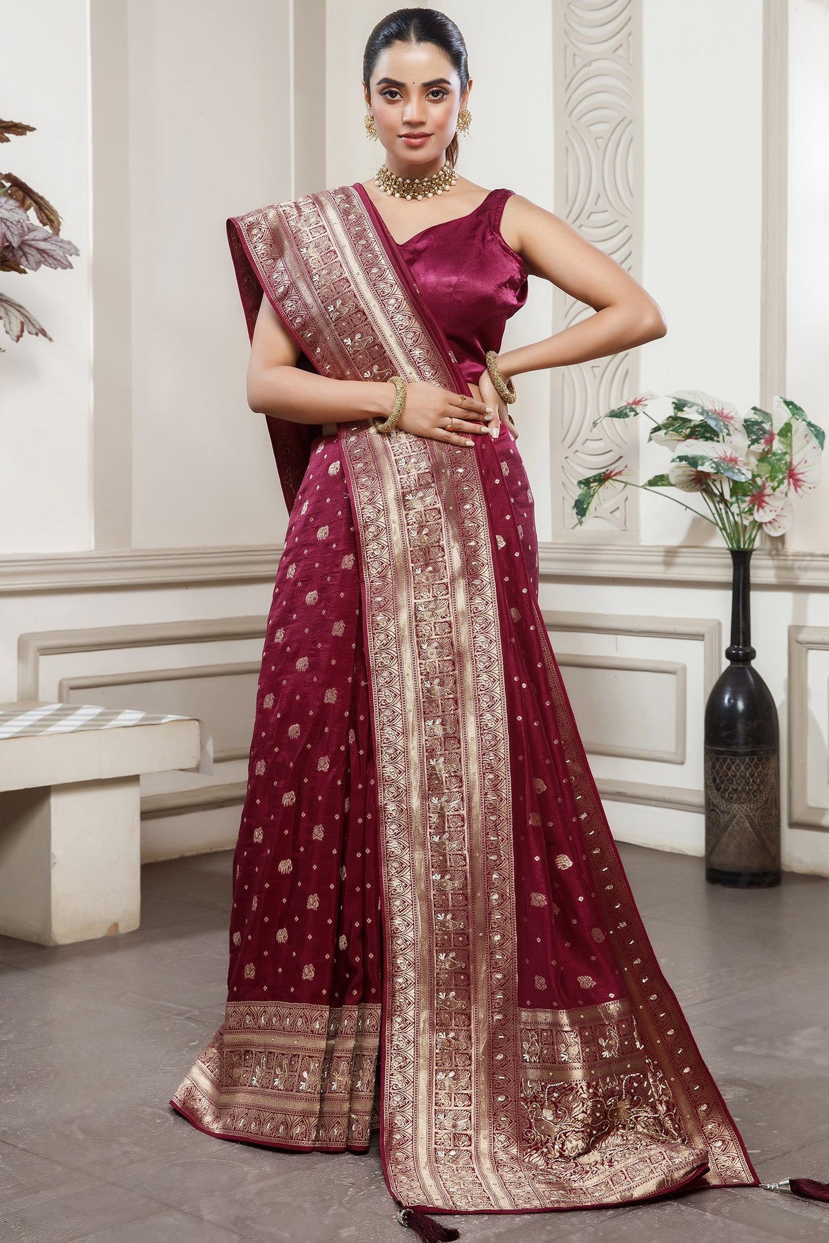 Magenta Dola Silk All Over Woven Saree styled with traditional jewelry