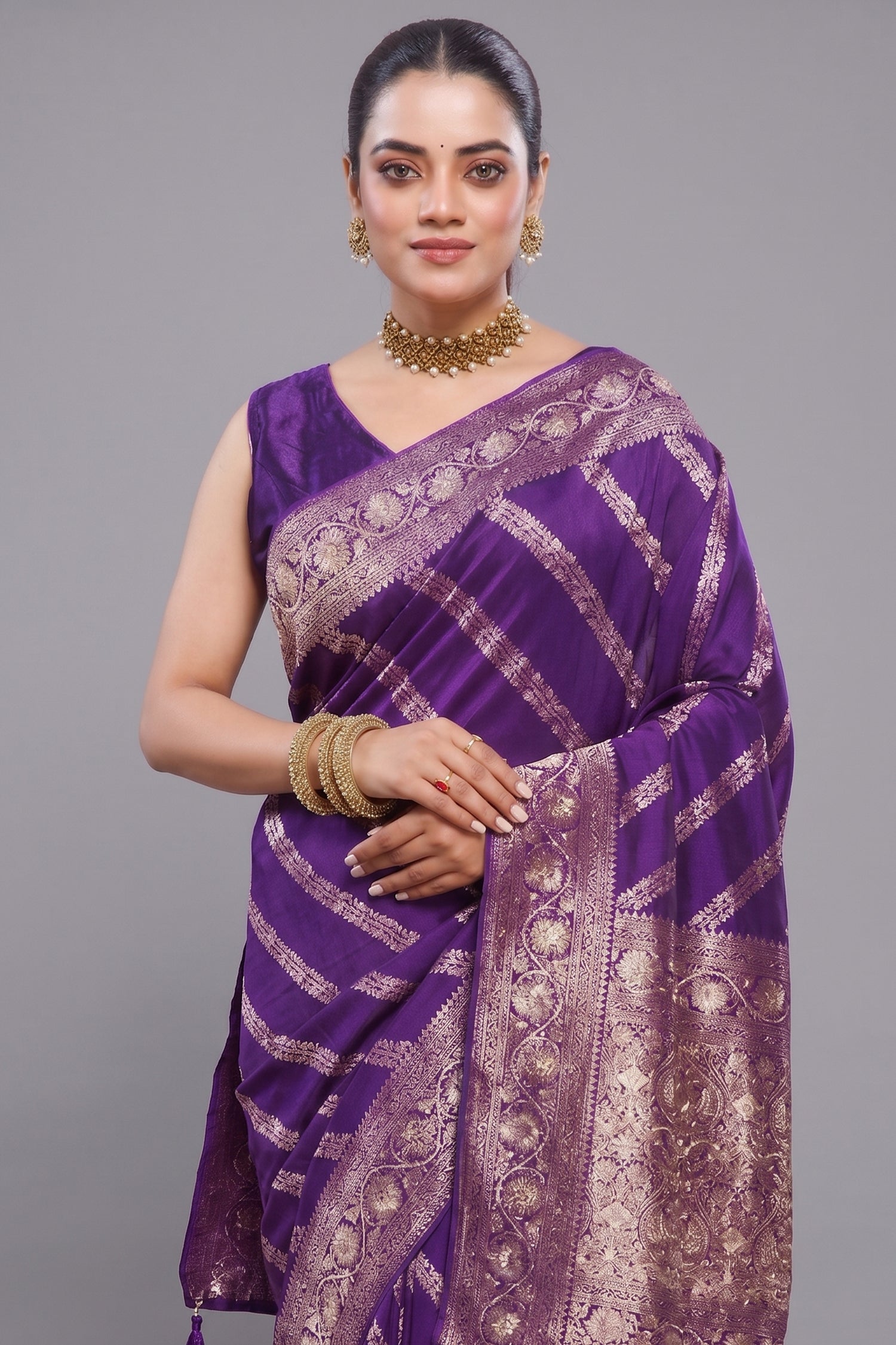 Close-up of intricate beaded details and gota work on the Violet Purple Dola Silk Lehehriya Saree