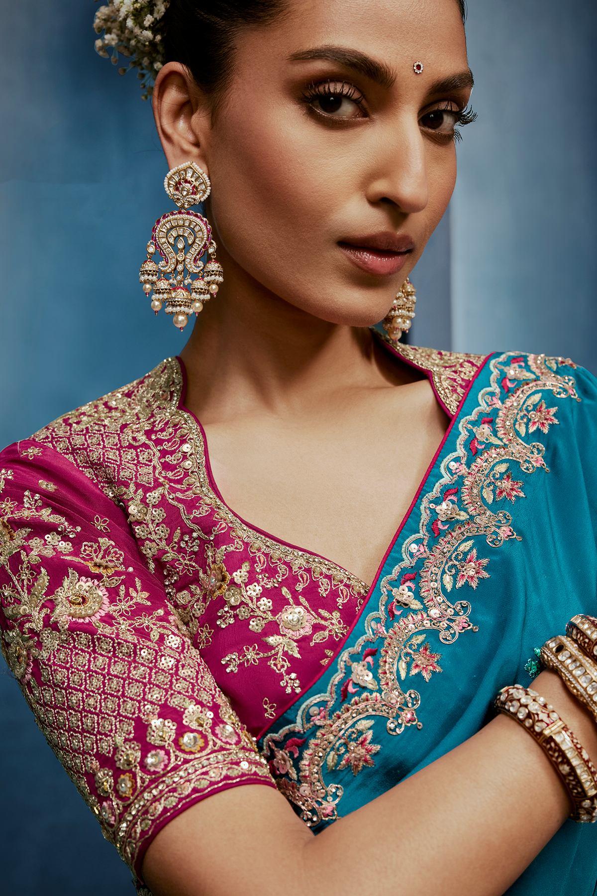 Teal Blue Saree with Magenta Contrasting Embroidered Blouse
