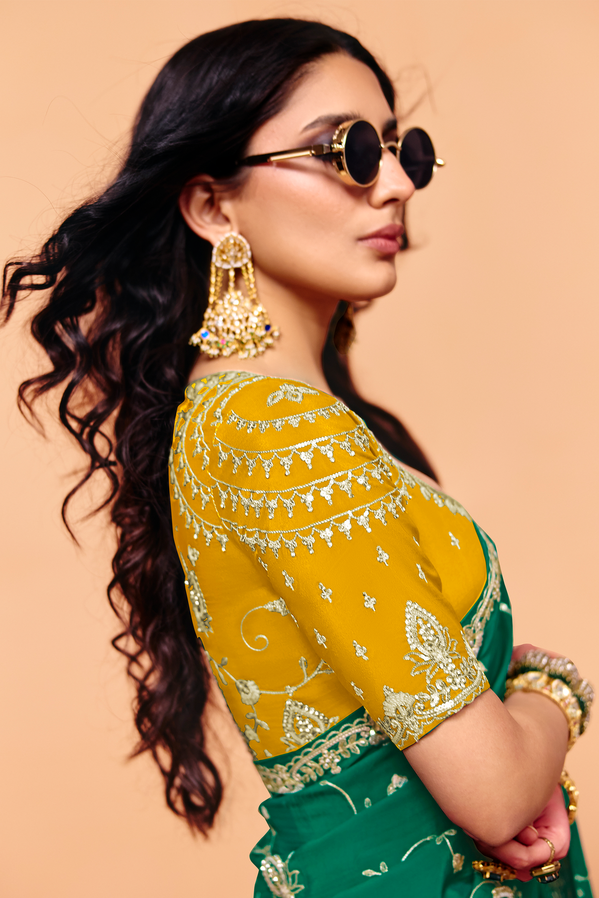 Emerald Green Satin Silk Saree With Heavy Sequin Work And Contrasting Yellow Blouse