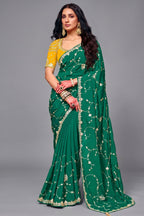 Emerald Green Satin Silk Saree With Heavy Sequin Work And Contrasting Yellow Blouse