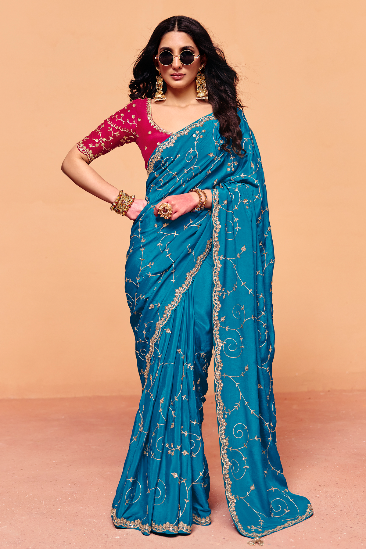 Vibrant Turquoise Satin Silk Saree with Heavy Sequin Embroidery And Pink Blouse