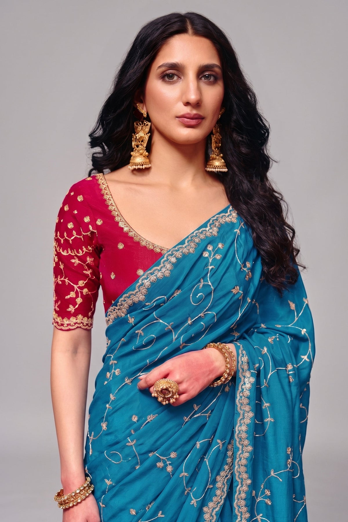 Vibrant Turquoise Satin Silk Saree with Heavy Sequin Embroidery And Pink Blouse