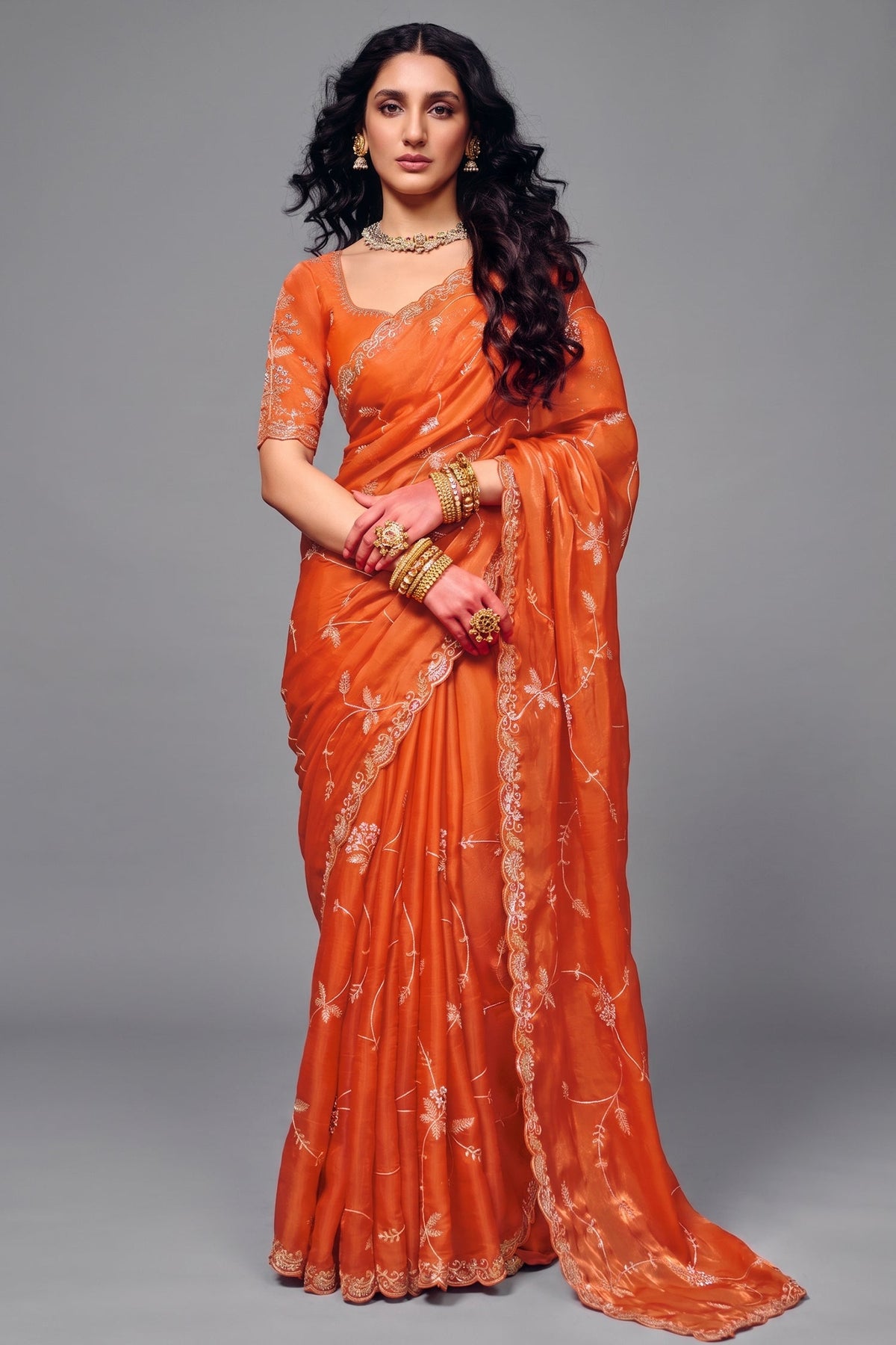 Tangerine Orange Organza Satin Saree Highlighted with Heavy Sequin Embroidery