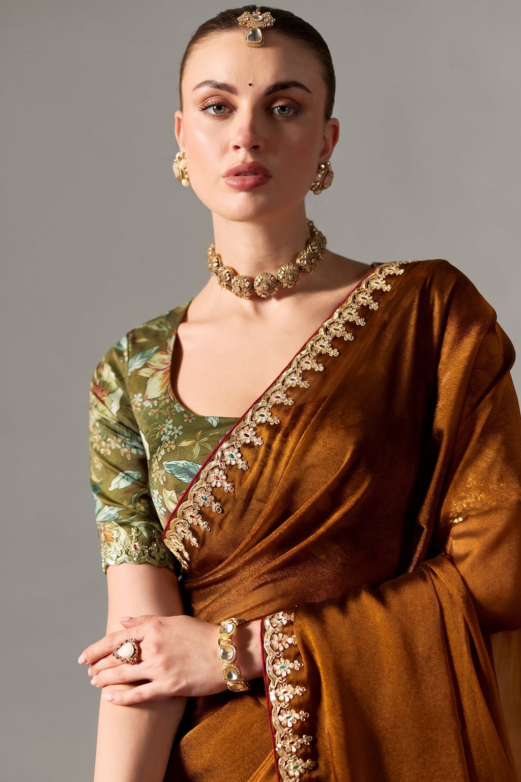 Rich Bronze Brown Tissue Saree Showcasing Embroidery
