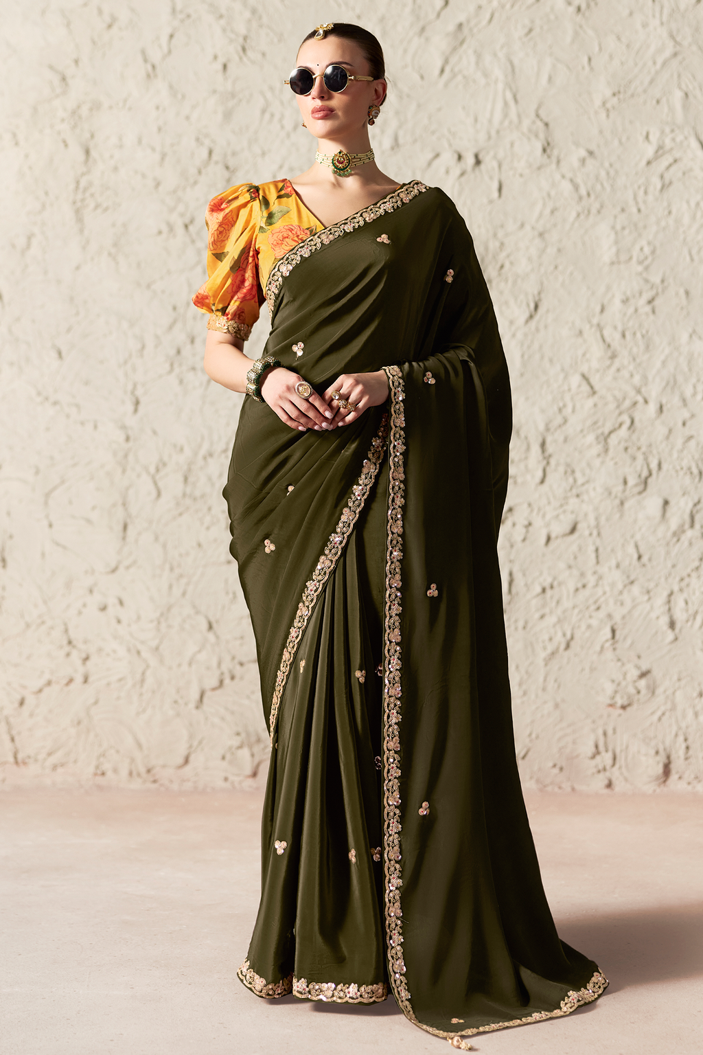 Deep Olive Green Organza Saree Highlighted With Sequins