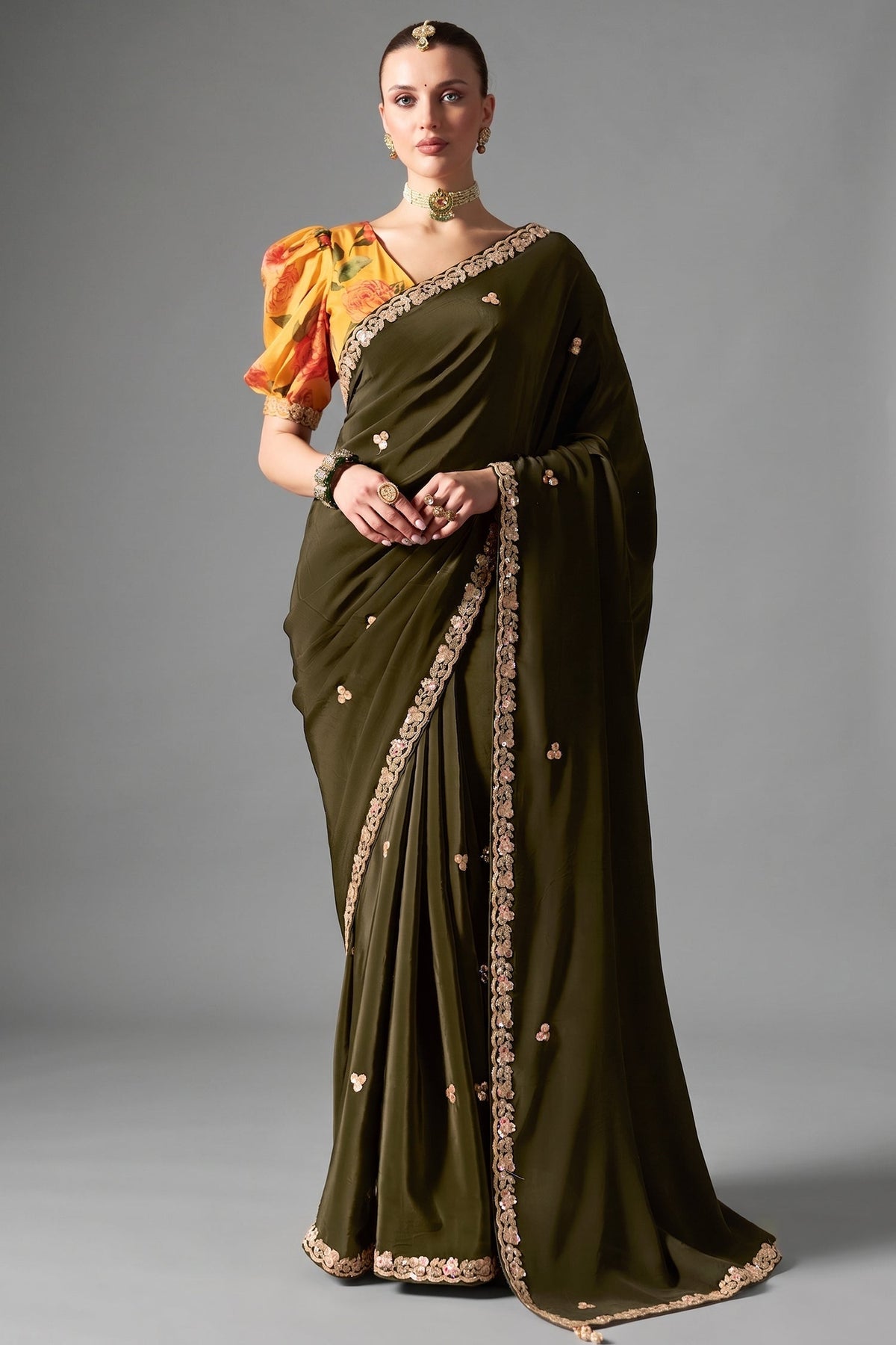Deep Olive Green Organza Saree Highlighted With Sequins