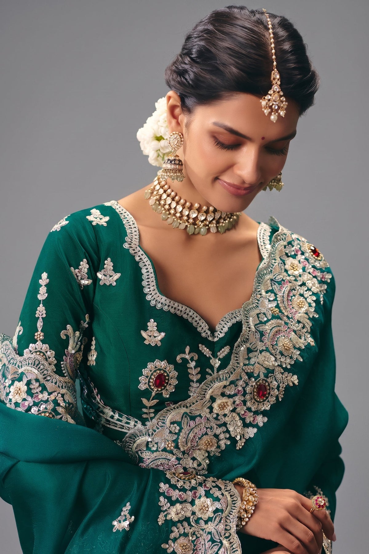 Emerald Green Silk Georgette Saree Adorned with Embroidery