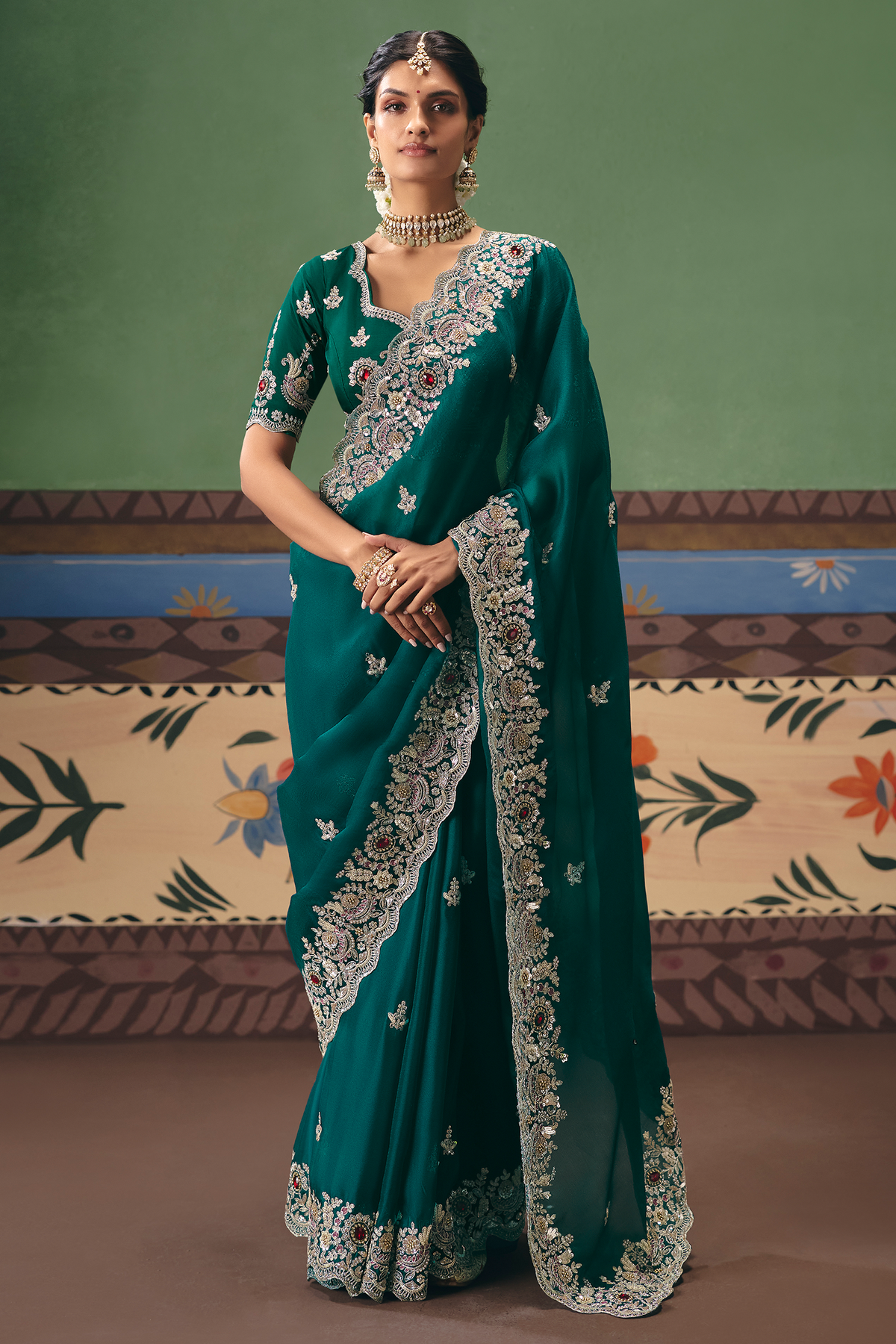 Emerald Green Silk Georgette Saree Adorned with Embroidery