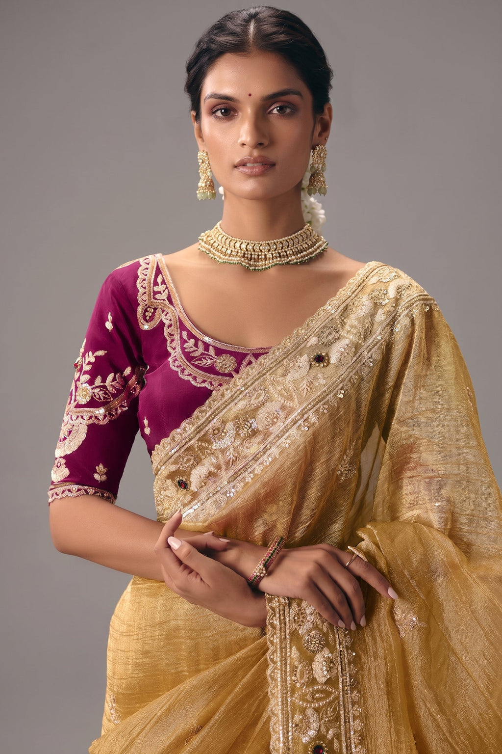 Honey Mustard Organza Saree Showcasing Heavy Border Work