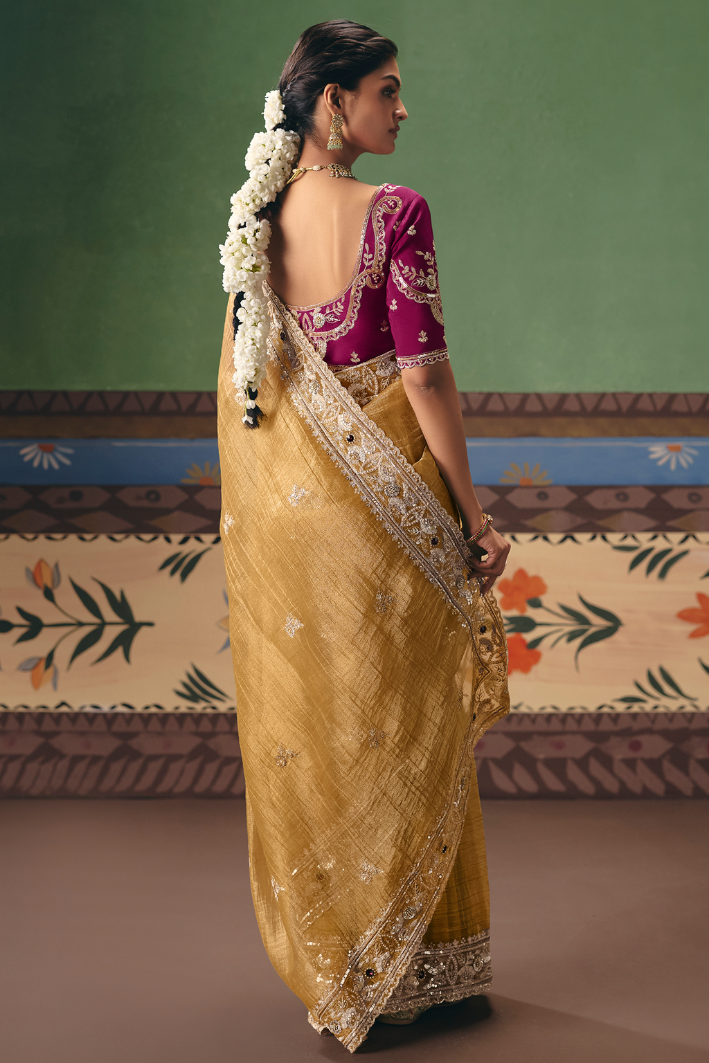 Honey Mustard Organza Saree Showcasing Heavy Border Work