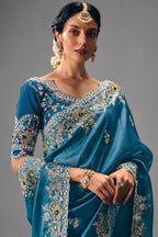 Slate Blue Georgette Saree Enriched With Intricate Silver Zari Work