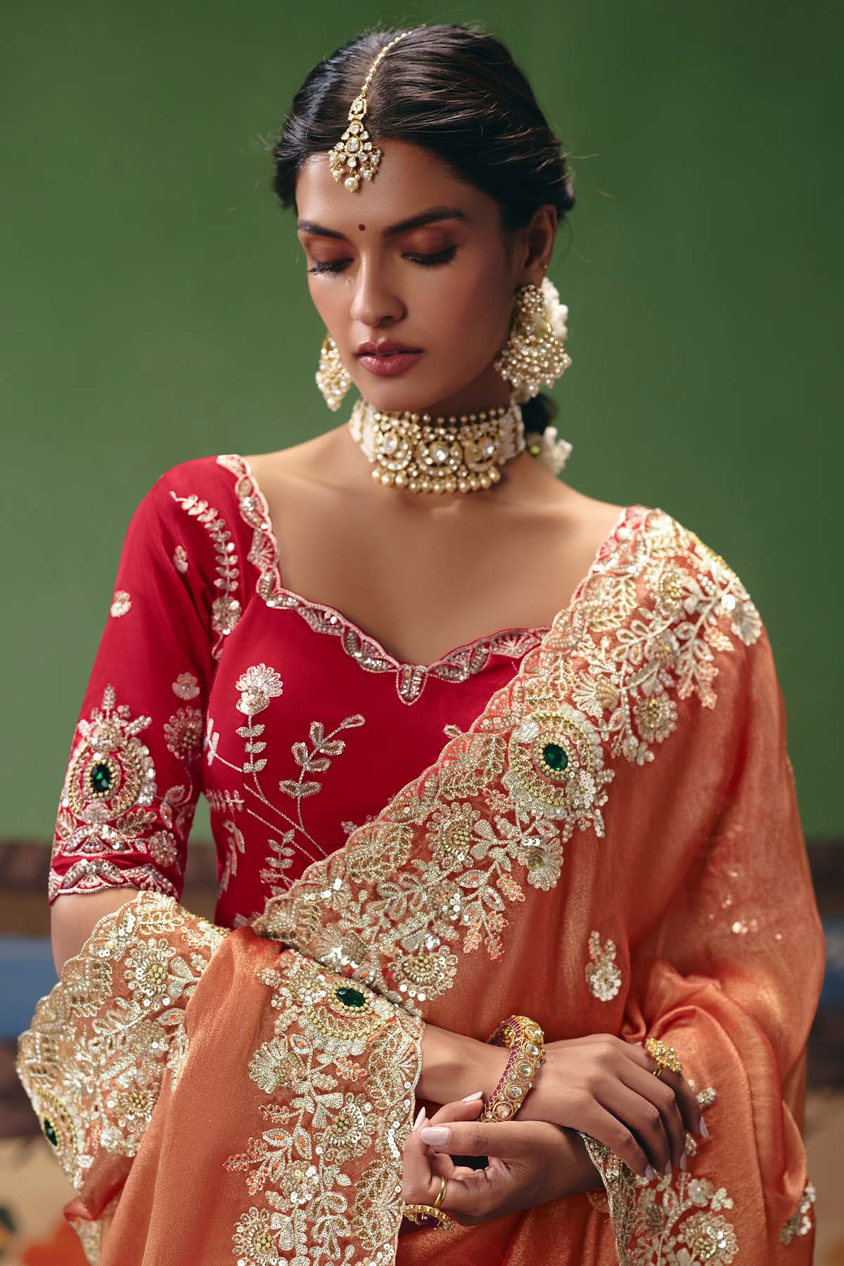 Rust Salmon Saree Highlighting Rich Floral Border Work
