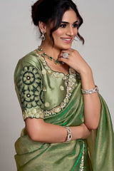 Olive Green Organza Saree Elevated With A Heavily Worked