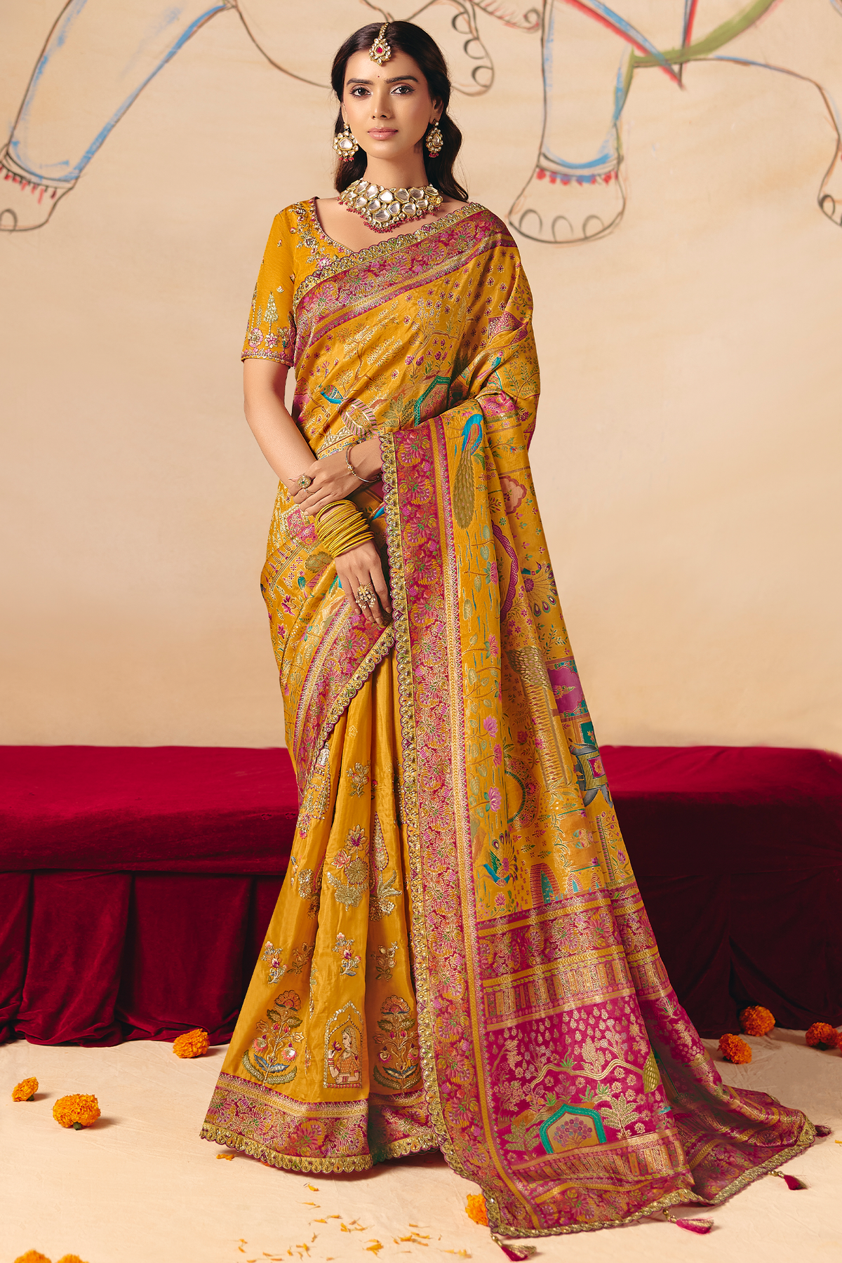 Turmeric Yellow Dola Silk Saree with Rich Pink Embroidered Contrasts