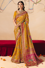 Turmeric Yellow Dola Silk Saree with Rich Pink Embroidered Contrasts