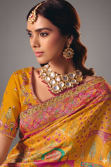 Turmeric Yellow Dola Silk Saree with Rich Pink Embroidered Contrasts