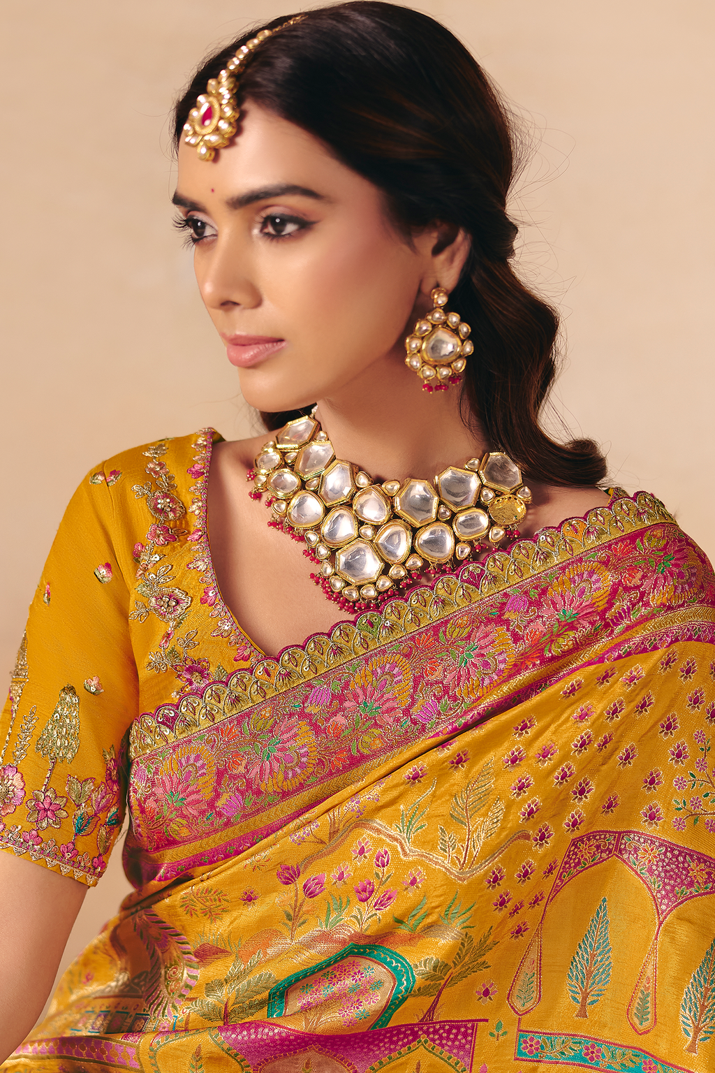 Turmeric Yellow Dola Silk Saree with Rich Pink Embroidered Contrasts