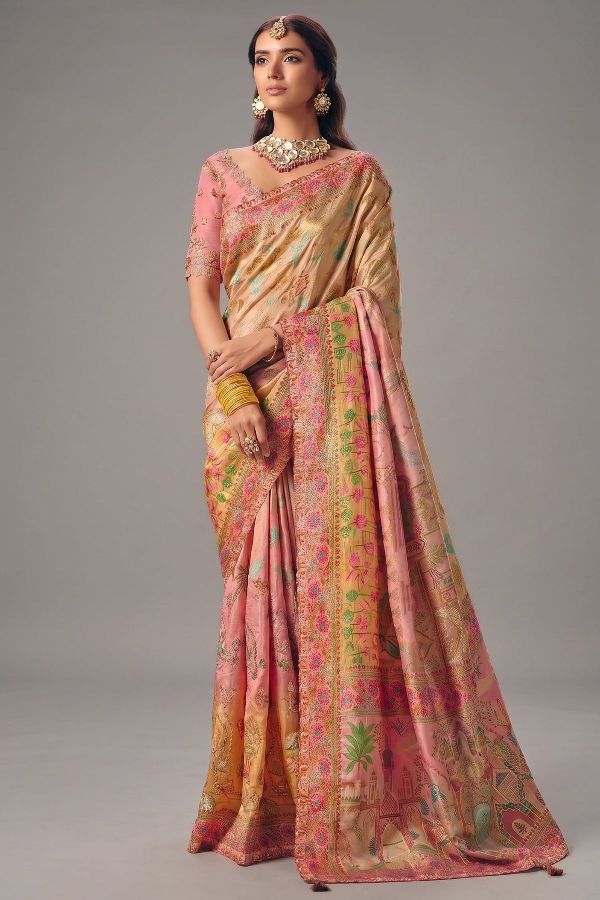 Champagne Peach Dola Silk Saree Detailed with Delicate Pastel Threadwork