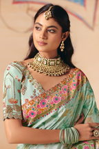 Mint Green Dola Silk Saree Highlighted with Heavy Cutwork Lace