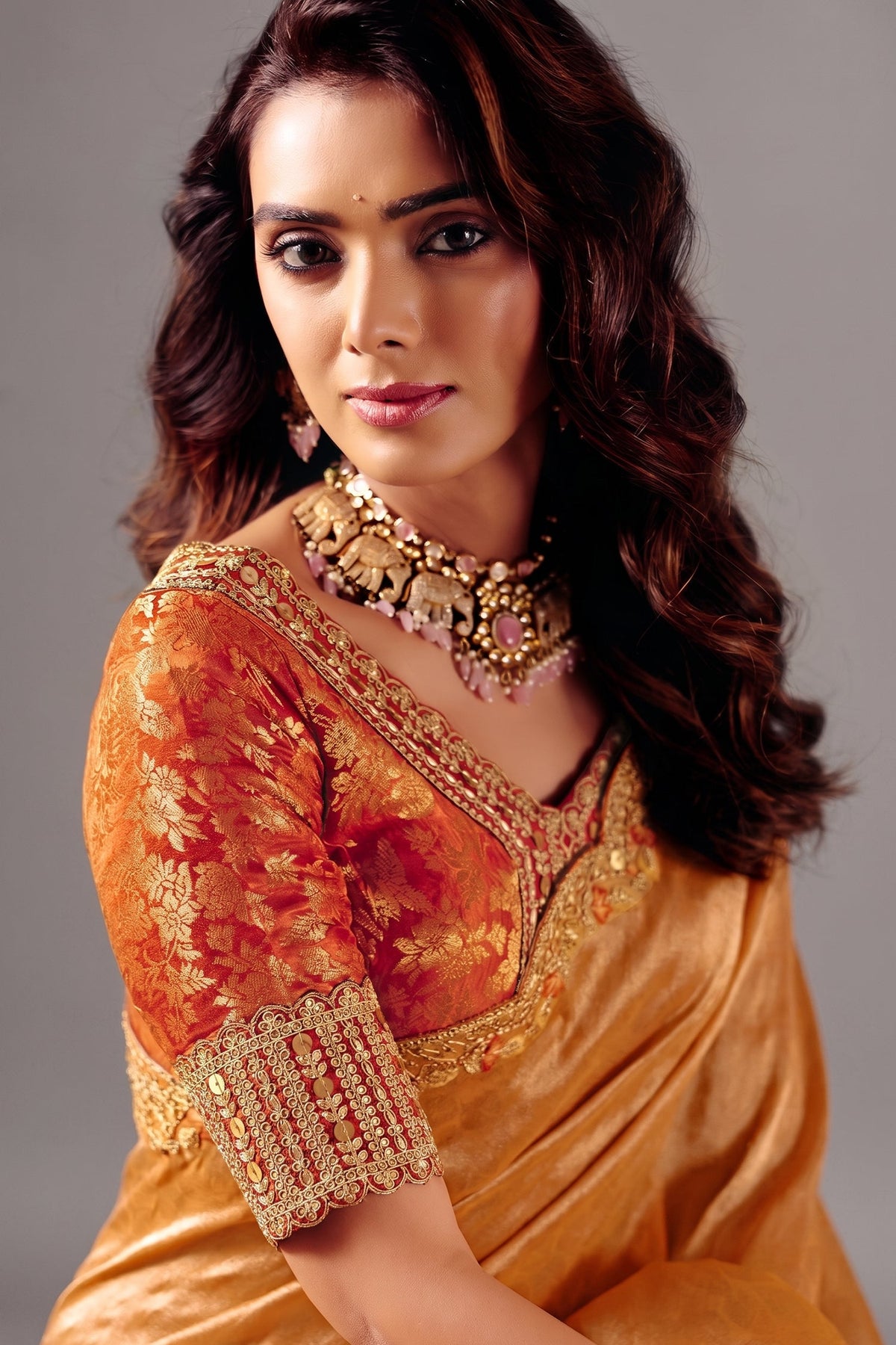 Shimmering Copper Orange Zari Silk Saree with Cutwork Embroidery