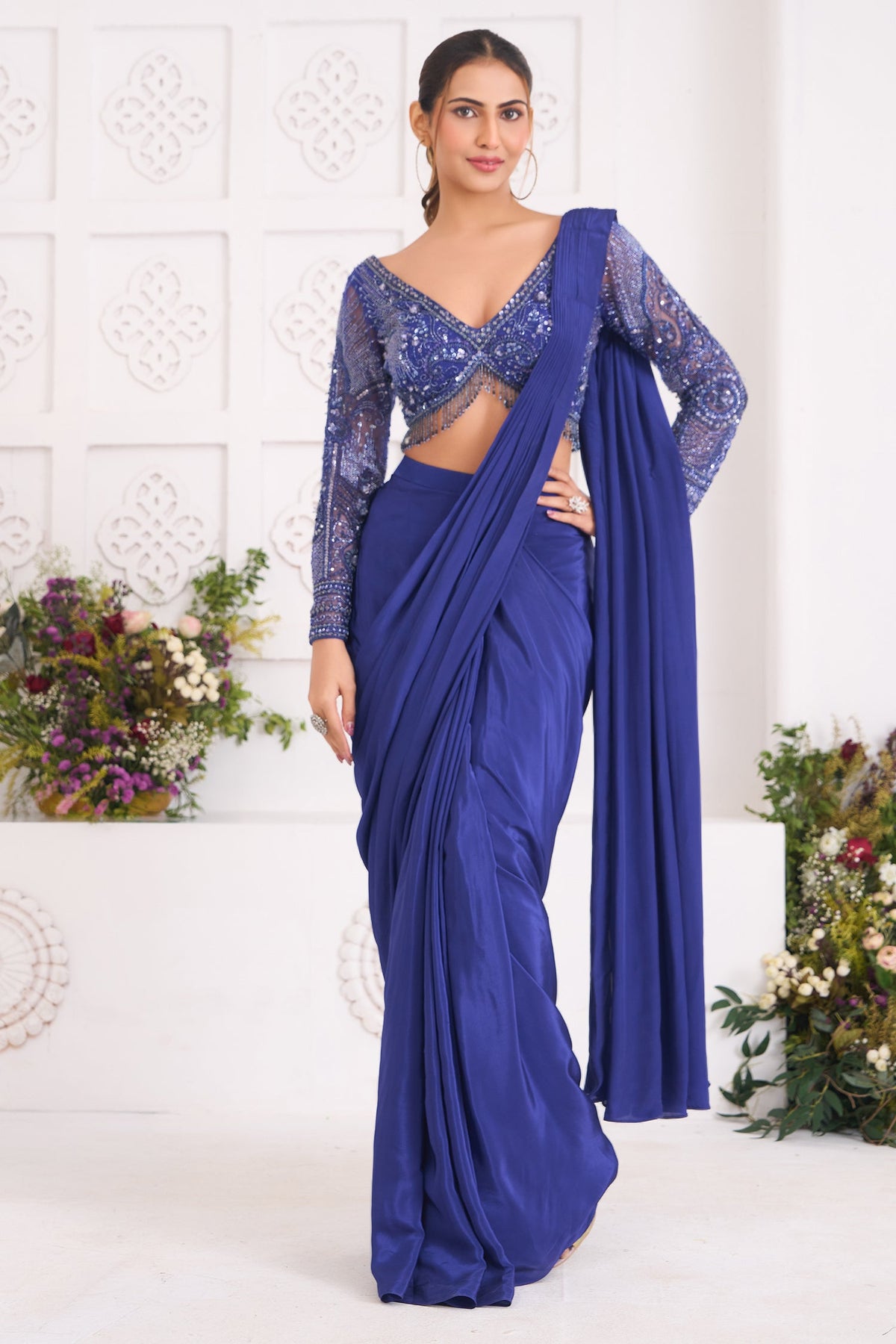 Indigo Blue Crepe Silk Pre-Draped Saree featuring Heavily Hand-Embellished V-Neck Full Sleeve Blouse