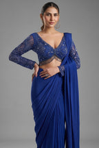 Indigo Blue Crepe Silk Pre-Draped Saree featuring Heavily Hand-Embellished V-Neck Full Sleeve Blouse