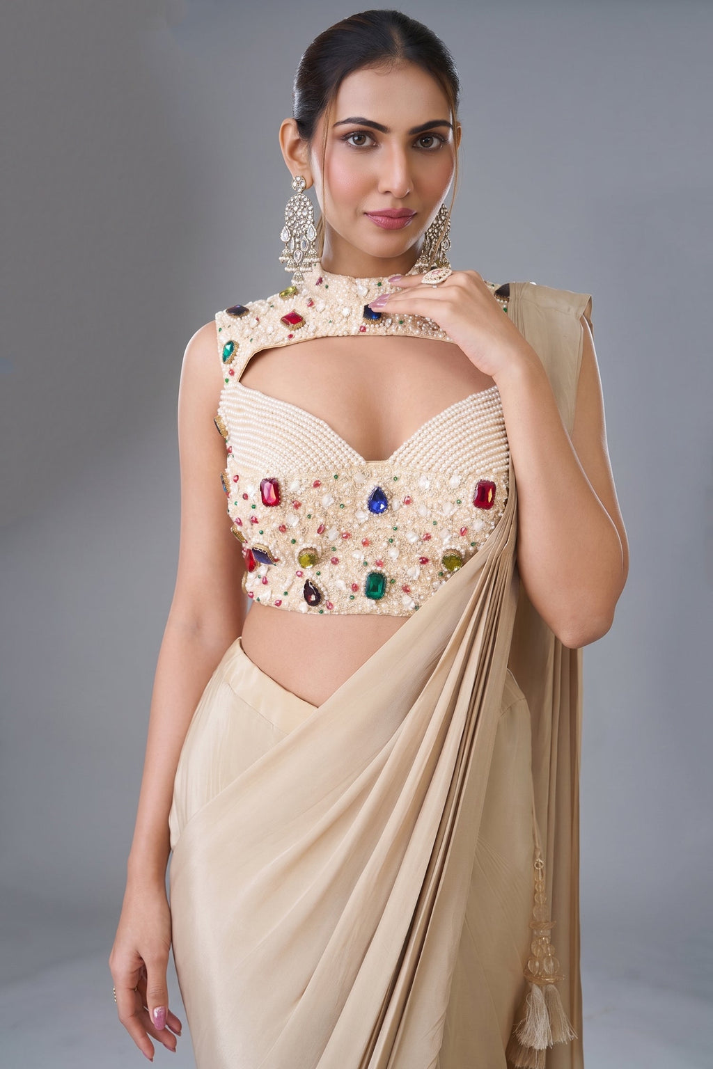 Champagne Beige Satin Crepe Pre-Draped Saree featuring Keyhole Cutout Choli Heavily Encrusted with Jewels