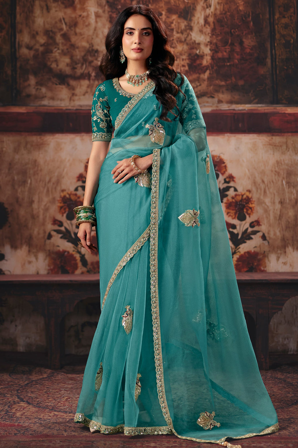 Sea Green Organza Saree with Intricate Border Work