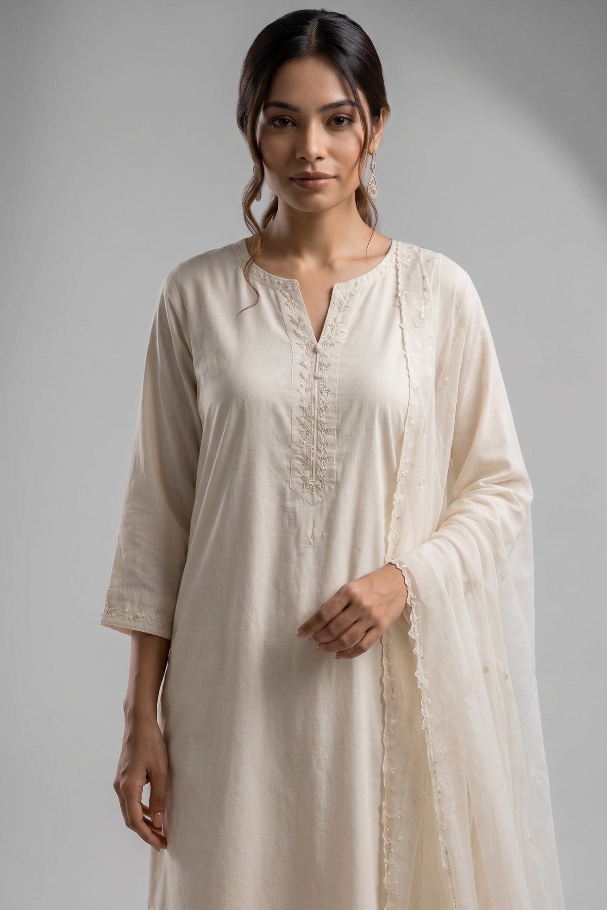 White Cotton Suit with Intricate Threadwork Embroidery