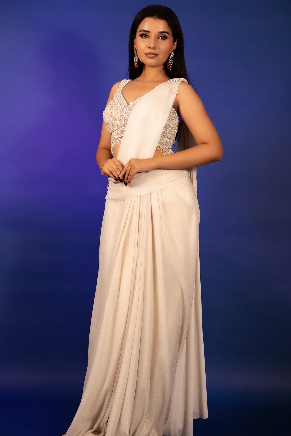 Off White Imported Lycra Readymade Saree with Cutdana and Diamond Work