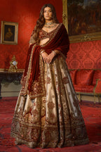 Golden Heavy Worked Lehenga in Banarasi Silk with Velvet Patch Work