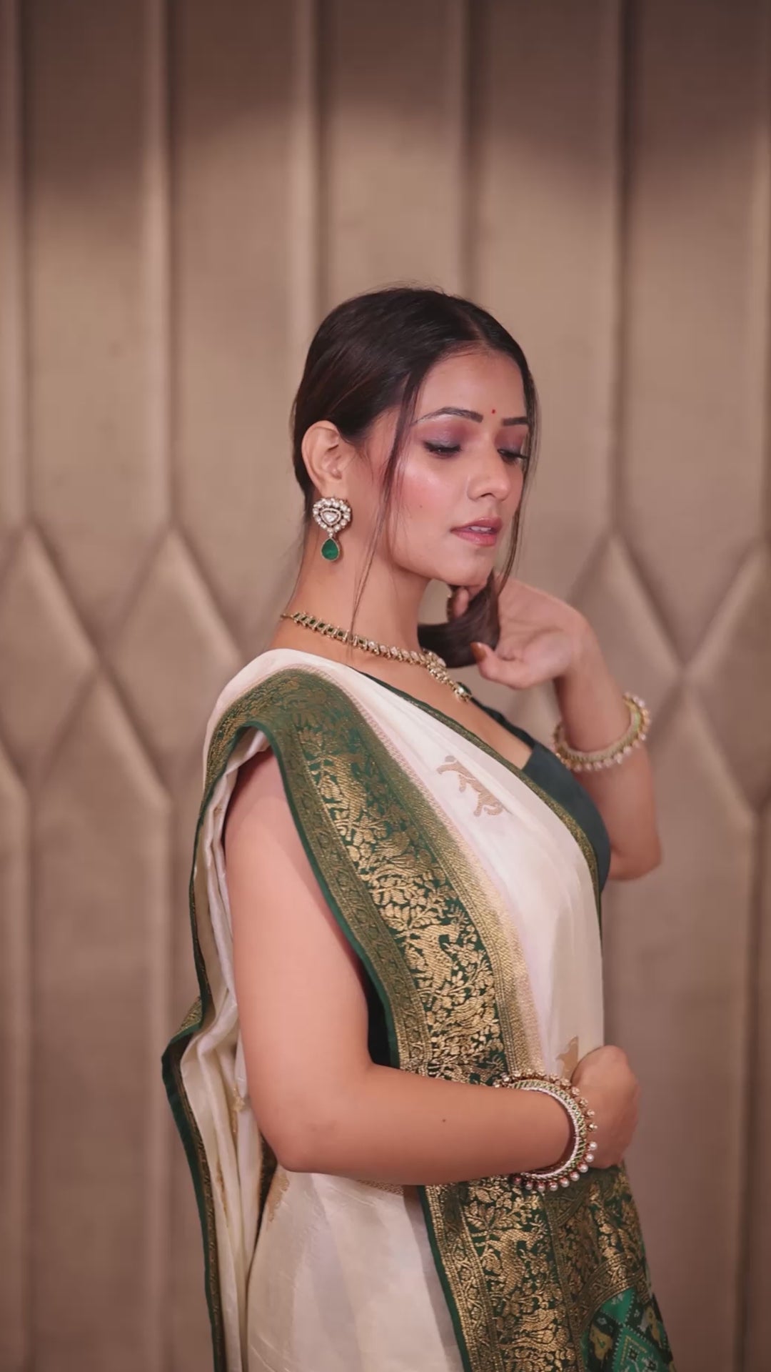 Off White Dola Silk Woven Butta Saree with Contrast Woven Border and Patola Pallu