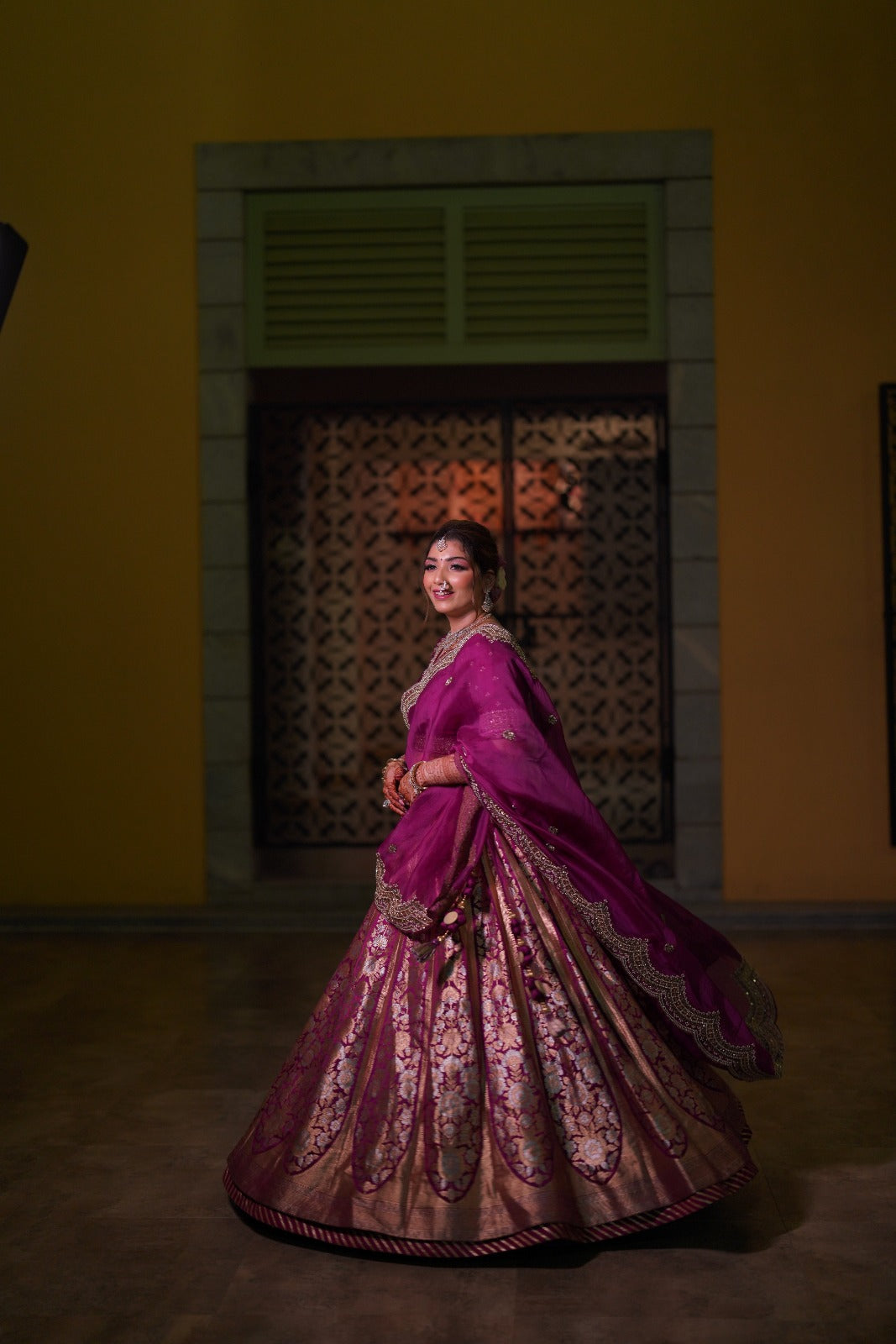 Asopalav bride in a purple embellished bridal lehenga