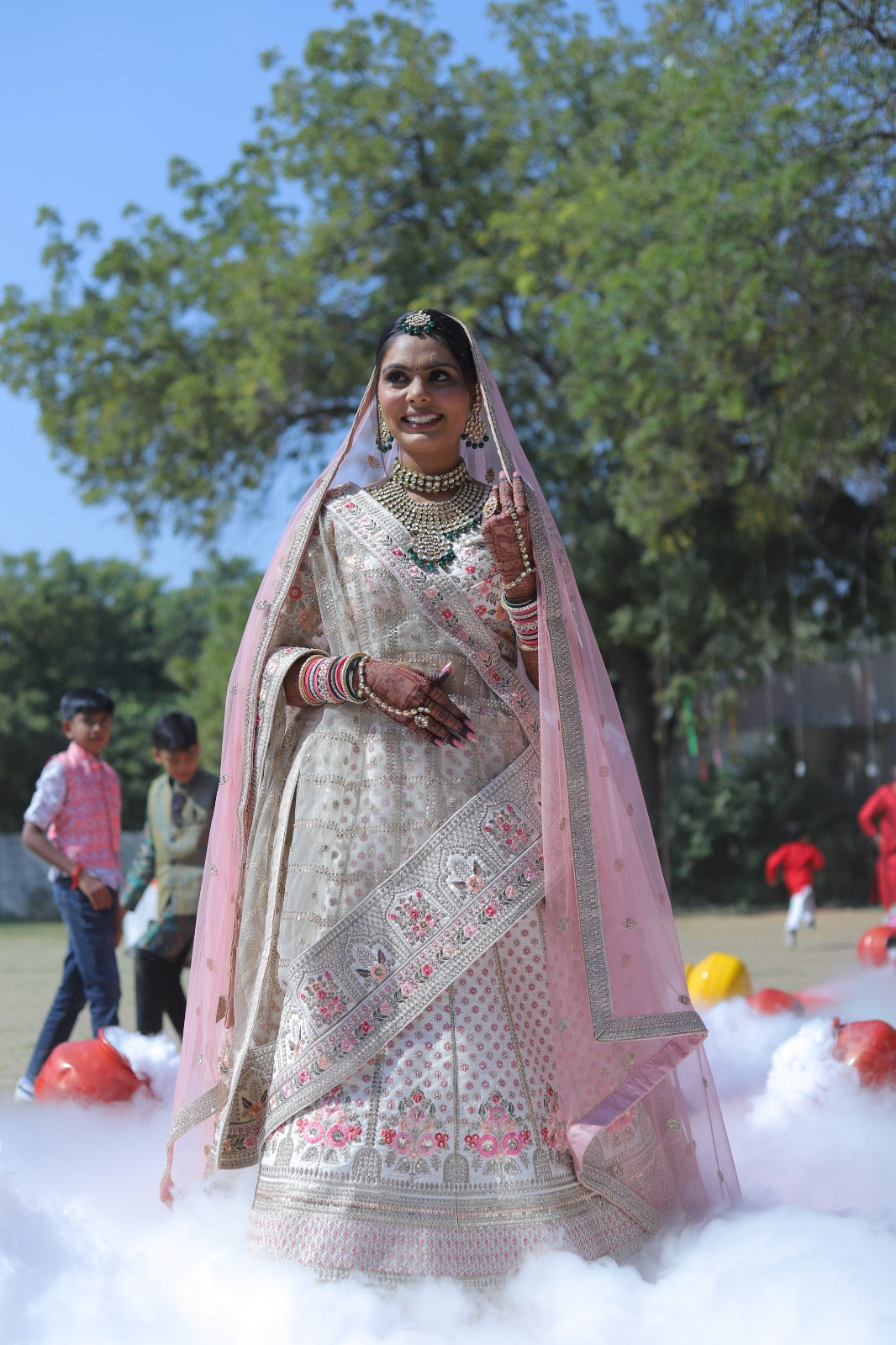Asopalav bride in an ivory bridal lehenga